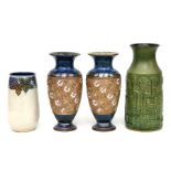 A pair of Royal Doulton stoneware vases, 28cms high; together with a Royal Doulton Lambeth vase,