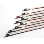 A quantity of violin bows.