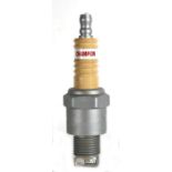 An original 1960's Champion Spark Plug wall sign modelled as a Champion spark plug, made by