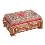 A tramp ware carved wooden box, 26cms wide.Condition ReportGood overall condition, as per images