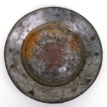 An Islamic / Moorish tinned copper dish with engraved decoration, 34cms diameter.