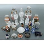 A quantity of Chinese and Japanese ceramics to include blanc de chine style figures; a pair of