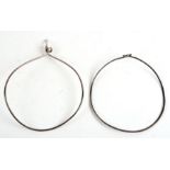 Two silver torc necklaces, 14 and 13cms diameter (2).
