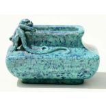 A Chinese blue glazed rectangular brush washer with applied chilong decoration, 8cms wide.