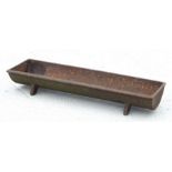 A cast iron pig trough / planter 86cm wide