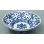 A Chinese Qing dynasty blue and white bowl, Qianlong mark to base, 21cms diameter.