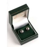 A pair of 14ct white gold diamond set pearl earrings.