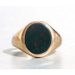 A 9ct gold gentleman's signet ring set with a blank oval bloodstone, approx UK size 'R', 7.7g.