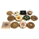 A collection of vintage compacts.