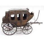 A metalware model of a carriage, 51cms long.