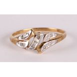 A 9ct gold diamond set dress ring, approx UK size 'O', 1.1g.