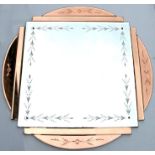 An Art Deco pink and clear glass wall mirror, 89cms wide.