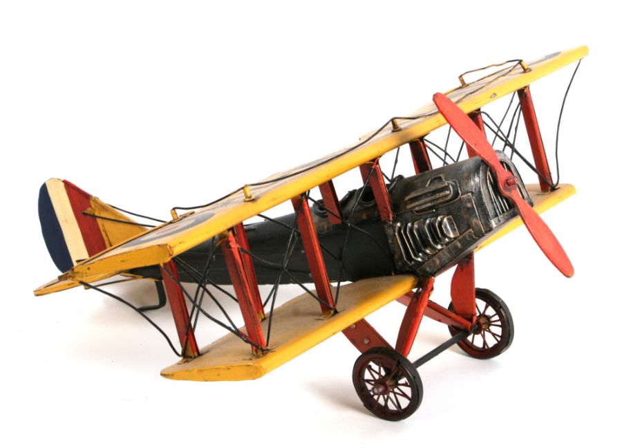 A contemporary tinplate WWI inspired bi-plane, wingspan 43cms.