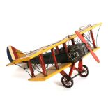 A contemporary tinplate WWI inspired bi-plane, wingspan 43cms.