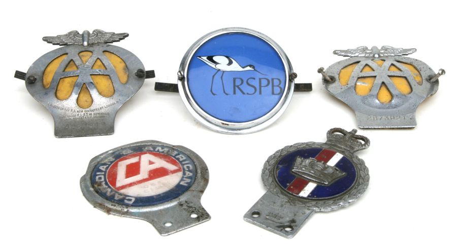 A group of car bar badges to include The AA and the RSPB.