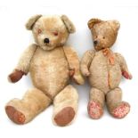 A large vintage plush teddy bear, approx 95cms high; together with three similar, each 78cms, 65 and