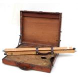 An artist's mahogany easel palette box with three later oak screw-in adjustable legs, 44cms wide.