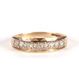 A 9ct gold diamond set half eternity ring, approx UK size 'O', 1.7g.