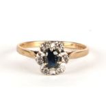 A 9ct gold diamond and sapphire cluster ring, approx UK size 'L', 1.8g.