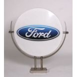 A Ford Perspex and stainless steel forecourt main dealer sign, 64cms diameter.