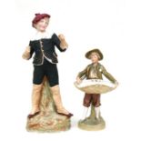 A Royal Dux figure of a boy holding a basket, pink triangle mark to the underside and numbered '