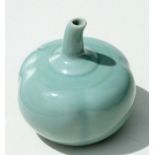 A Chinese celadon water dropper in the form of a pumpkin, 7.5cms wide.