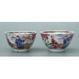 A pair of Chinese famille rose tea bowls, 8cms diameter (2). Condition ReportOne has a glued