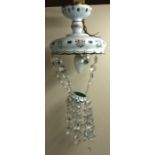 A Victorian opaque glass ceiling light with prismatic glass drops.