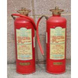 Two vintage fire extinguishers.