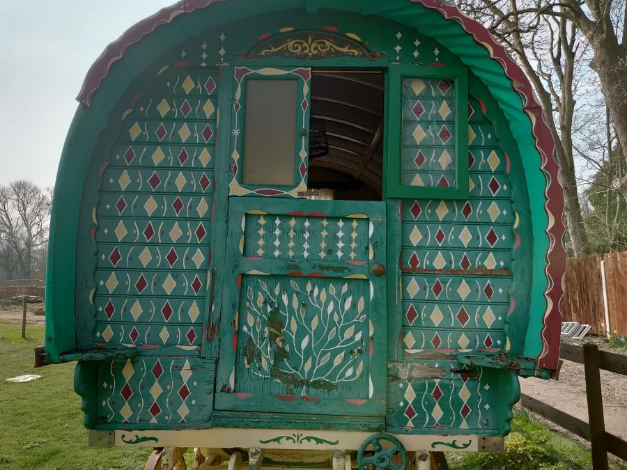 An early 20th century gypsy bowtop horses-drawn wagon with traditional painted decoration and fitted - Image 13 of 20