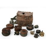 A small quantity of early 20th century fishing centrepin reels to include a mahogany brass star back