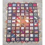 A patchwork wall hanging, 135 by 198cms.