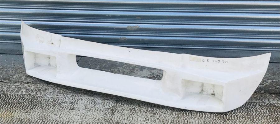 A racing MGB fibreglass front spoiler, part no. MGS70730, 240cms (55ins) wide.