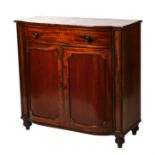 A Regency mahogany side cabinet, the crossbanded top above a single frieze drawer and cupboards
