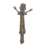 A cast brass / bronze stylised figure of Christ, 24cms wide.
