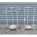 Two painted metal washbowl stands (2).