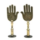 A pair of antique brass Islamic engraved Hamsa Hands or Hands of Fatima decorated with Islamic