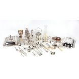 A quantity of silver plate to include egg cups on stand, entrée dishes, sugar casters, wine coaster,