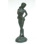 A loaded bronze study of a female nude, titled 'Introspection' and indistinctly signed, 24cms high.