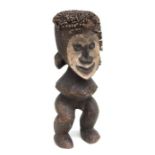 African Art / Tribal Art: a carved wooden Mambila (Cameroons) male figure, 36cms high.