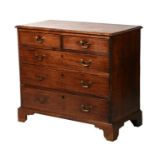 A Georgian mahogany chest of two short and three graduated long drawers, cut into two parts, on