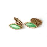 A pair of Chinese 18ct gold and jade cufflinks of navette form, total weight 4.8g.Condition