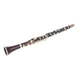 A late 19th / early 20th century five-piece hardwood clarinet, 65cms long.