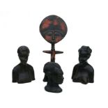 A group of African and Asian carved wooden busts and similar items, the largest 42cms high (9).