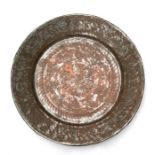 An Indo-Persian tinned copper dish, 45cms diameter.