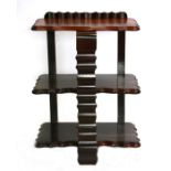 A continental walnut three-tier Whatnot with shaped rectangular tiers, 54cms wide.