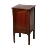 An Edwardian mahogany pot cupboard, 38cms wide.