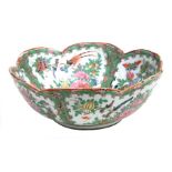 A Chinese famille rose Canton bowl decorated with birds, insects and butterflies, 25cms diameter (