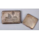 A white metal Marsh Arab ware Niello decorated cigarette case; together with a silver compact,