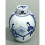A Chinese blue & white ginger jar and cover decorated with a figure on a terrace and two robed
